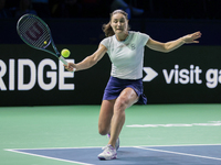 Monica Niculescu of Romania plays a forehand during the Billie Jean King Cup match between Japan and Romania at Palacio de los Deportes Mart...