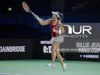 Eri Hozumi of Japan plays a forehand during the Billie Jean King Cup match between Japan and Romania at Palacio de los Deportes Martin Carpe...