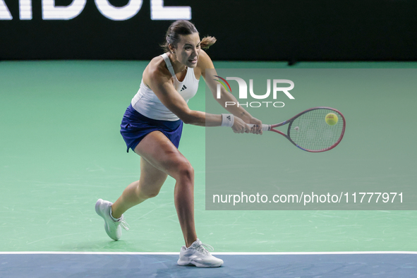 Elena Gabriela Ruse of Romania plays a backhand during the Billie Jean King Cup match between Japan and Romania at Palacio de los Deportes M...