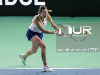 Elena Gabriela Ruse of Romania plays a backhand during the Billie Jean King Cup match between Japan and Romania at Palacio de los Deportes M...