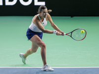 Elena Gabriela Ruse of Romania plays a backhand during the Billie Jean King Cup match between Japan and Romania at Palacio de los Deportes M...