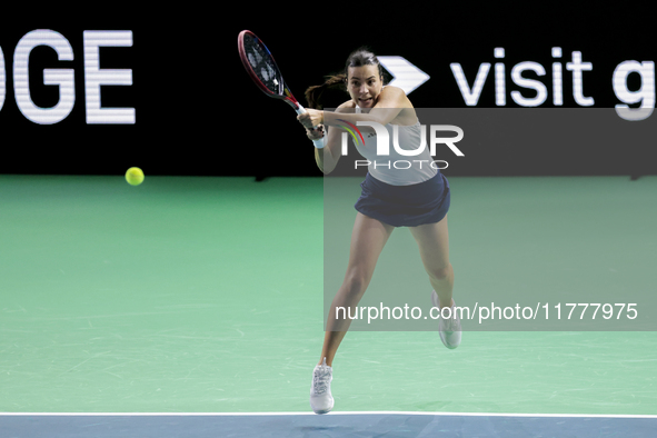 Elena Gabriela Ruse of Romania plays a backhand during the Billie Jean King Cup match between Japan and Romania at Palacio de los Deportes M...