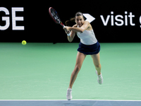 Elena Gabriela Ruse of Romania plays a backhand during the Billie Jean King Cup match between Japan and Romania at Palacio de los Deportes M...