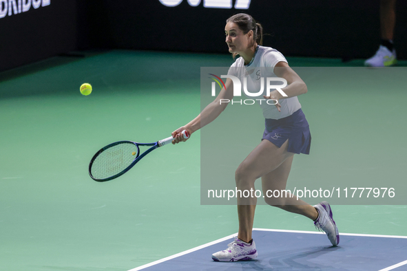 Monica Niculescu of Romania plays a forehand during the Billie Jean King Cup match between Japan and Romania at Palacio de los Deportes Mart...