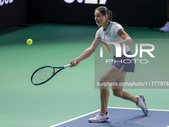 Monica Niculescu of Romania plays a forehand during the Billie Jean King Cup match between Japan and Romania at Palacio de los Deportes Mart...