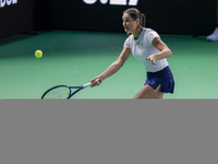 Monica Niculescu of Romania plays a forehand during the Billie Jean King Cup match between Japan and Romania at Palacio de los Deportes Mart...