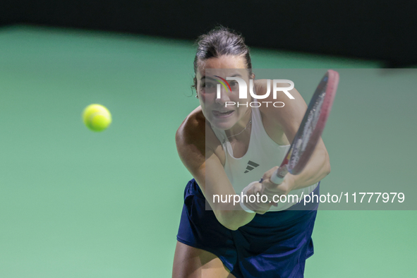 Elena Gabriela Ruse of Romania plays a backhand during the Billie Jean King Cup match between Japan and Romania at Palacio de los Deportes M...