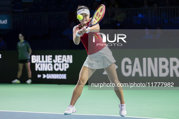 Eri Hozumi of Japan plays backwards during the Billie Jean King Cup match between Japan and Romania at Palacio de los Deportes Martin Carpen...