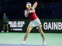 Eri Hozumi of Japan plays backwards during the Billie Jean King Cup match between Japan and Romania at Palacio de los Deportes Martin Carpen...