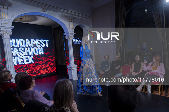 A model presents a creation by Hungarian designer Takacs during Budapest Fashion Week in Budapest, Hungary, on November 14, 2024, at Hall of...