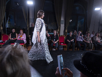 A model presents a creation by Hungarian designer Takacs during Budapest Fashion Week in Budapest, Hungary, on November 14, 2024, at Hall of...