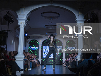 A model presents a creation by Hungarian designer Charmina during Budapest Fashion Week in Budapest, Hungary, on November 14, 2024, at Hall...