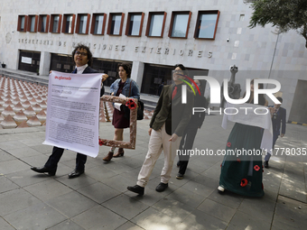 Pro-Palestine activists in Mexico City, Mexico, on November 14, 2024, demonstrate outside the Ministry of Foreign Affairs, demanding that Cl...