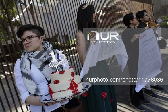 Pro-Palestine activists in Mexico City, Mexico, on November 14, 2024, demonstrate outside the Ministry of Foreign Affairs, demanding that Cl...