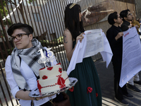 Pro-Palestine activists in Mexico City, Mexico, on November 14, 2024, demonstrate outside the Ministry of Foreign Affairs, demanding that Cl...