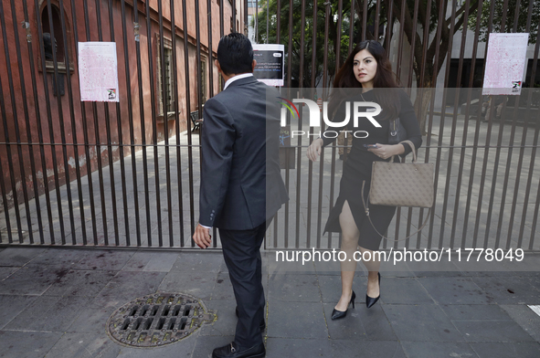 Passersby try to outwit pro-Palestine activists in Mexico City, Mexico, on November 14, 2024, who demonstrate outside the Museo Memoria y To...