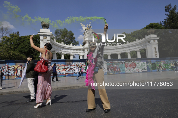 A pro-Palestine activist stands in Mexico City, Mexico, outside the Ministry of Foreign Affairs, where more people demand that Claudia Shein...