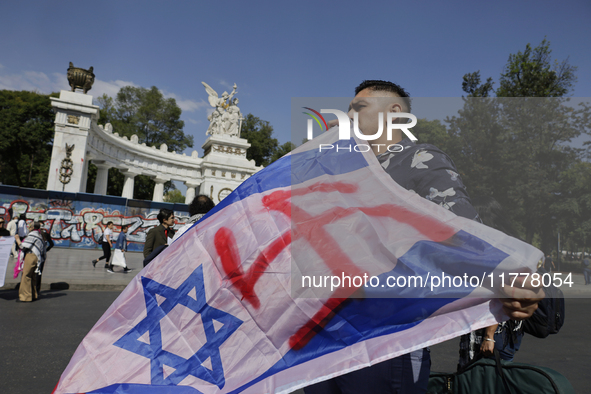 Pro-Palestine activists in Mexico City, Mexico, on November 14, 2024, dance a 15th birthday waltz and demonstrate in the Hemiciclo a Juarez,...