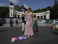 Pro-Palestine activists in Mexico City, Mexico, on November 14, 2024, dance a 15th birthday waltz and demonstrate in the Hemiciclo a Juarez,...