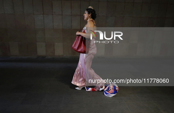 A pro-Palestine activist in Mexico City, Mexico, drags an Israeli flag outside the Ministry of Foreign Affairs, where more people demand tha...