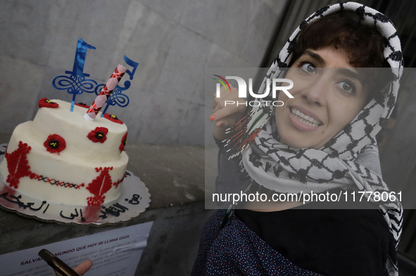 A pro-Palestine activist in Mexico City, Mexico, demonstrates outside the Ministry of Foreign Affairs, where more people demand that Claudia...