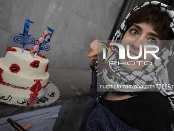 A pro-Palestine activist in Mexico City, Mexico, demonstrates outside the Ministry of Foreign Affairs, where more people demand that Claudia...