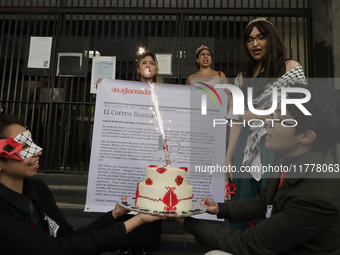 Pro-Palestine activists in Mexico City, Mexico, on November 14, 2024, carry a cake and demonstrate outside the Ministry of Foreign Affairs,...