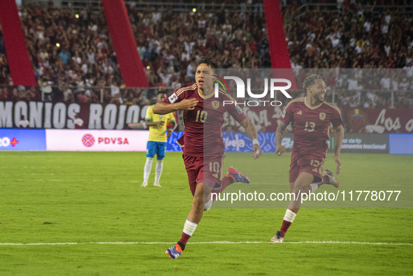 Venezuelan national team players celebrate after scoring a goal during the 2026 FIFA World Cup qualifier against Brazil at the Monumental st...