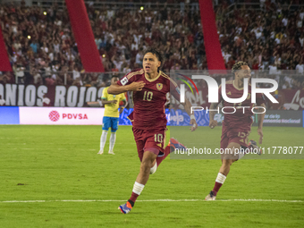 Venezuelan national team players celebrate after scoring a goal during the 2026 FIFA World Cup qualifier against Brazil at the Monumental st...