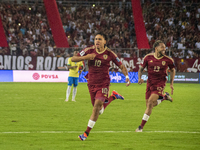 Venezuelan national team players celebrate after scoring a goal during the 2026 FIFA World Cup qualifier against Brazil at the Monumental st...