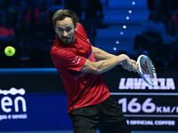 Daniil Medvedev (RUS) competes against Jannik Sinner (ITA) during day five of the Nitto ATP Finals 2024 at Inalpi Arena in Turin, Italy, on...