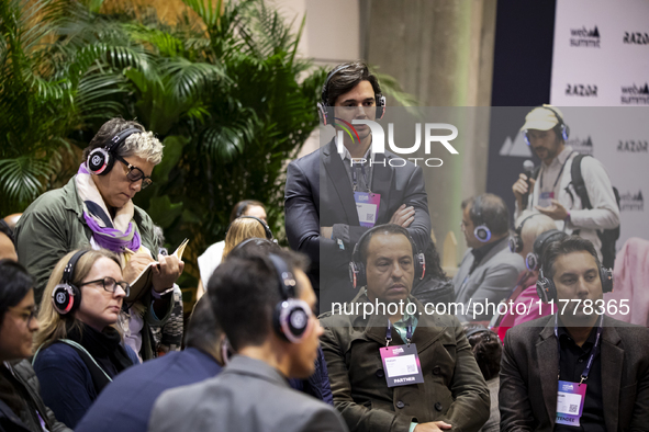 People sit at the round tables in Fil during the last day of the Web Summit 2024 in Lisbon, Portugal, on November 14, 2024 