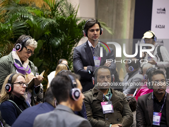 People sit at the round tables in Fil during the last day of the Web Summit 2024 in Lisbon, Portugal, on November 14, 2024 (