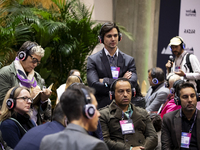 People sit at the round tables in Fil during the last day of the Web Summit 2024 in Lisbon, Portugal, on November 14, 2024 (