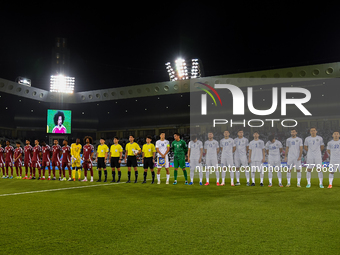 Qatar and Uzbekistan team players line up before the FIFA World Cup 2026 AFC Asian Qualifiers 3rd round group A match between Qatar and Uzbe...