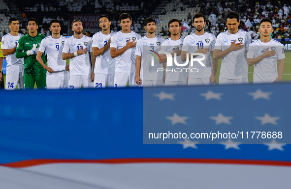 Uzbekistan team players line up before the FIFA World Cup 2026 AFC Asian Qualifiers 3rd round group A match between Qatar and Uzbekistan at...