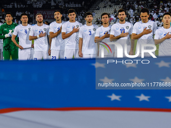 Uzbekistan team players line up before the FIFA World Cup 2026 AFC Asian Qualifiers 3rd round group A match between Qatar and Uzbekistan at...