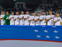 Uzbekistan team players line up before the FIFA World Cup 2026 AFC Asian Qualifiers 3rd round group A match between Qatar and Uzbekistan at...