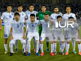 Uzbekistan team players pose for a team photo before the FIFA World Cup 2026 AFC Asian Qualifiers 3rd round group A match between Qatar and...