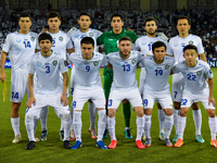 Uzbekistan team players pose for a team photo before the FIFA World Cup 2026 AFC Asian Qualifiers 3rd round group A match between Qatar and...