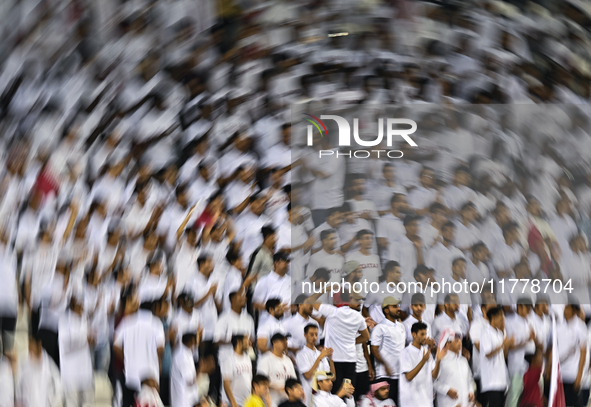 Fans of Qatar cheer during the FIFA World Cup 2026 AFC Asian Qualifiers 3rd round group A match between Qatar and Uzbekistan at Jassim Bin H...