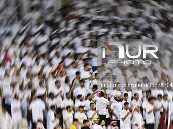 Fans of Qatar cheer during the FIFA World Cup 2026 AFC Asian Qualifiers 3rd round group A match between Qatar and Uzbekistan at Jassim Bin H...