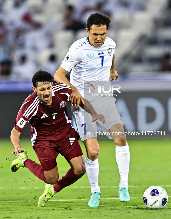 Ahmed Alggannehi (#7) of Qatar battles for the ball with Otabek Shukurov (#7) of Uzbekistan during the FIFA World Cup 2026 AFC Asian Qualifi...