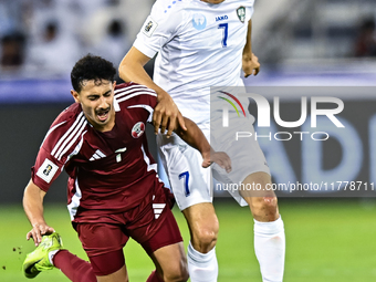 Ahmed Alggannehi (#7) of Qatar battles for the ball with Otabek Shukurov (#7) of Uzbekistan during the FIFA World Cup 2026 AFC Asian Qualifi...