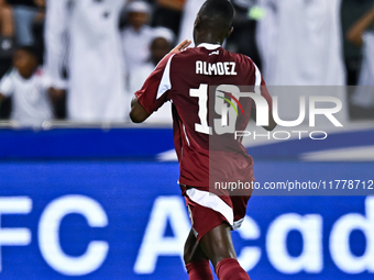 Almoez Ali (#19) of Qatar celebrates after scoring a goal during the FIFA World Cup 2026 AFC Asian Qualifiers 3rd round group A match betwee...