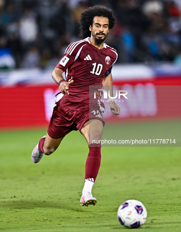 Akram Afif (C) (#10) of Qatar plays in the FIFA World Cup 2026 AFC Asian Qualifiers third round group A match between Qatar and Uzbekistan a...