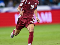 Akram Afif (C) (#10) of Qatar plays in the FIFA World Cup 2026 AFC Asian Qualifiers third round group A match between Qatar and Uzbekistan a...