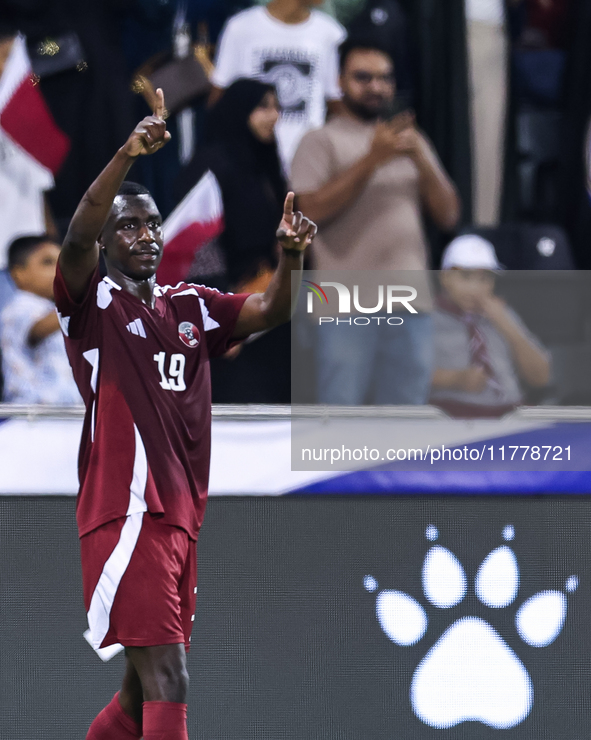 Almoez Ali (#19) of Qatar celebrates after scoring a goal during the FIFA World Cup 2026 AFC Asian Qualifiers third round group A match betw...