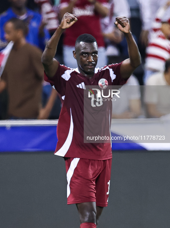 Almoez Ali (#19) of Qatar celebrates after scoring a goal during the FIFA World Cup 2026 AFC Asian Qualifiers third round group A match betw...