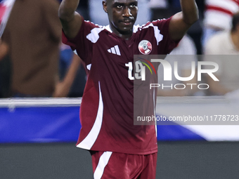 Almoez Ali (#19) of Qatar celebrates after scoring a goal during the FIFA World Cup 2026 AFC Asian Qualifiers third round group A match betw...